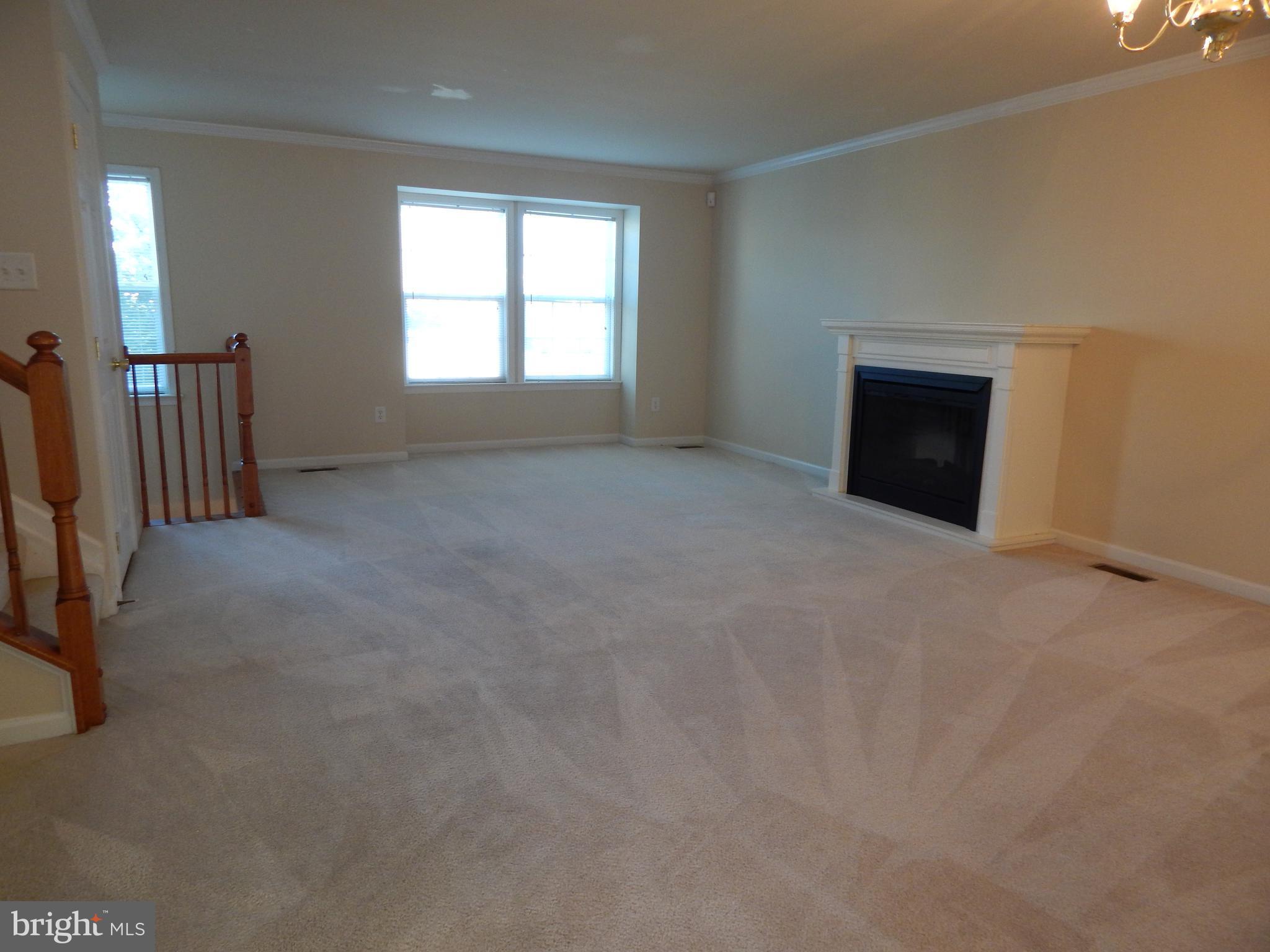 124 Raphael Court Martinsburg, WV 25403 - Photo 12 of 30 an empty room with windows