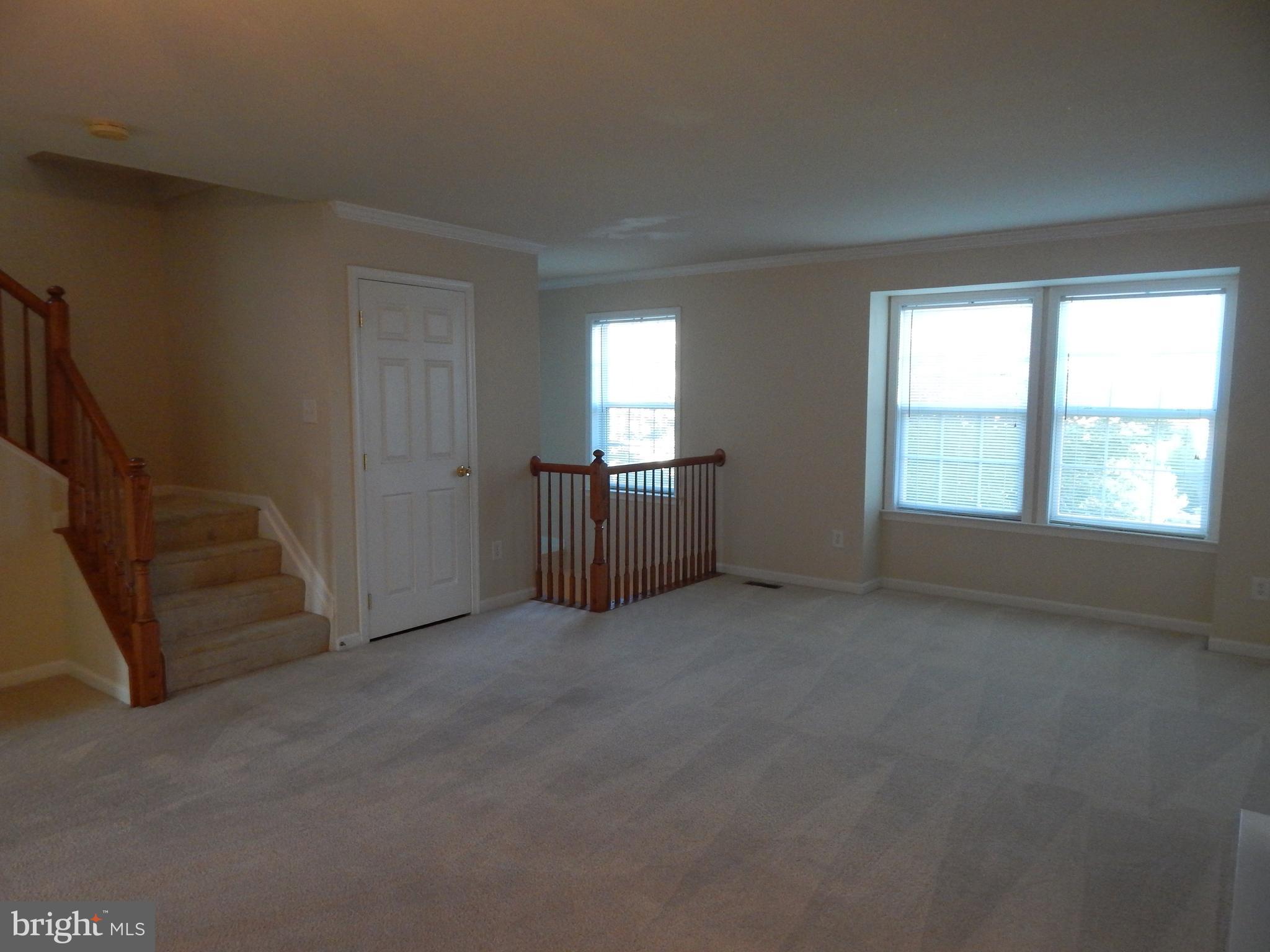 124 Raphael Court Martinsburg, WV 25403 - Photo 13 of 30 an empty room with windows