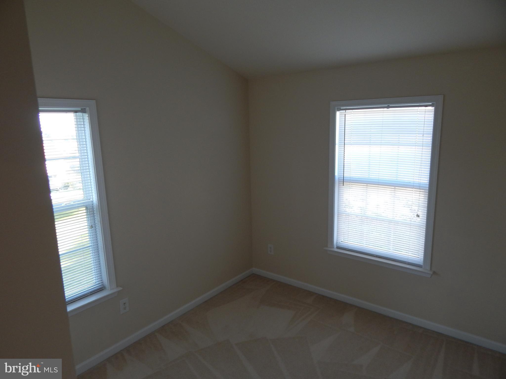 124 Raphael Court Martinsburg, WV 25403 - Photo 23 of 30 a room that has a window in it