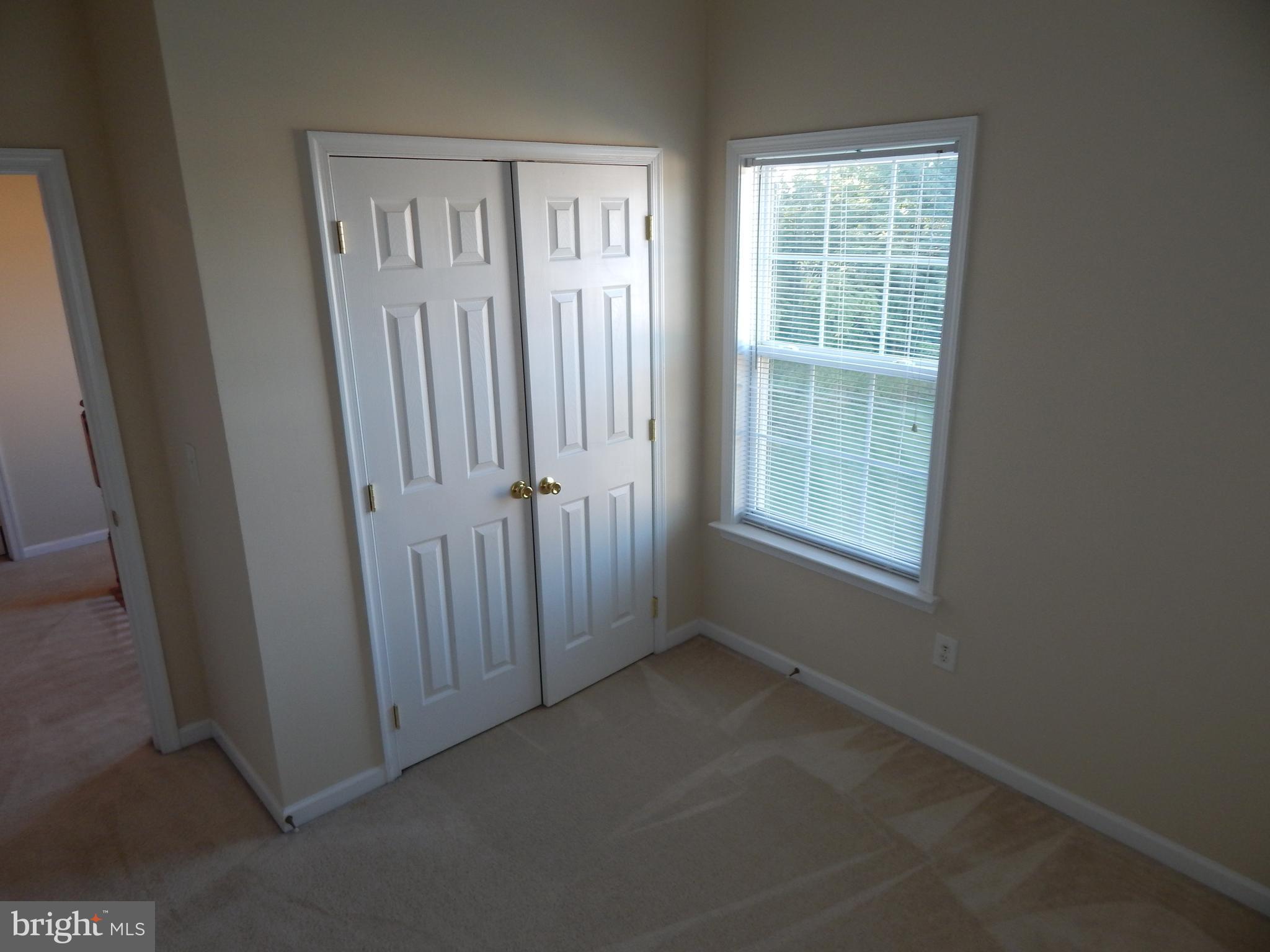 124 Raphael Court Martinsburg, WV 25403 - Photo 24 of 30 an empty room with windows