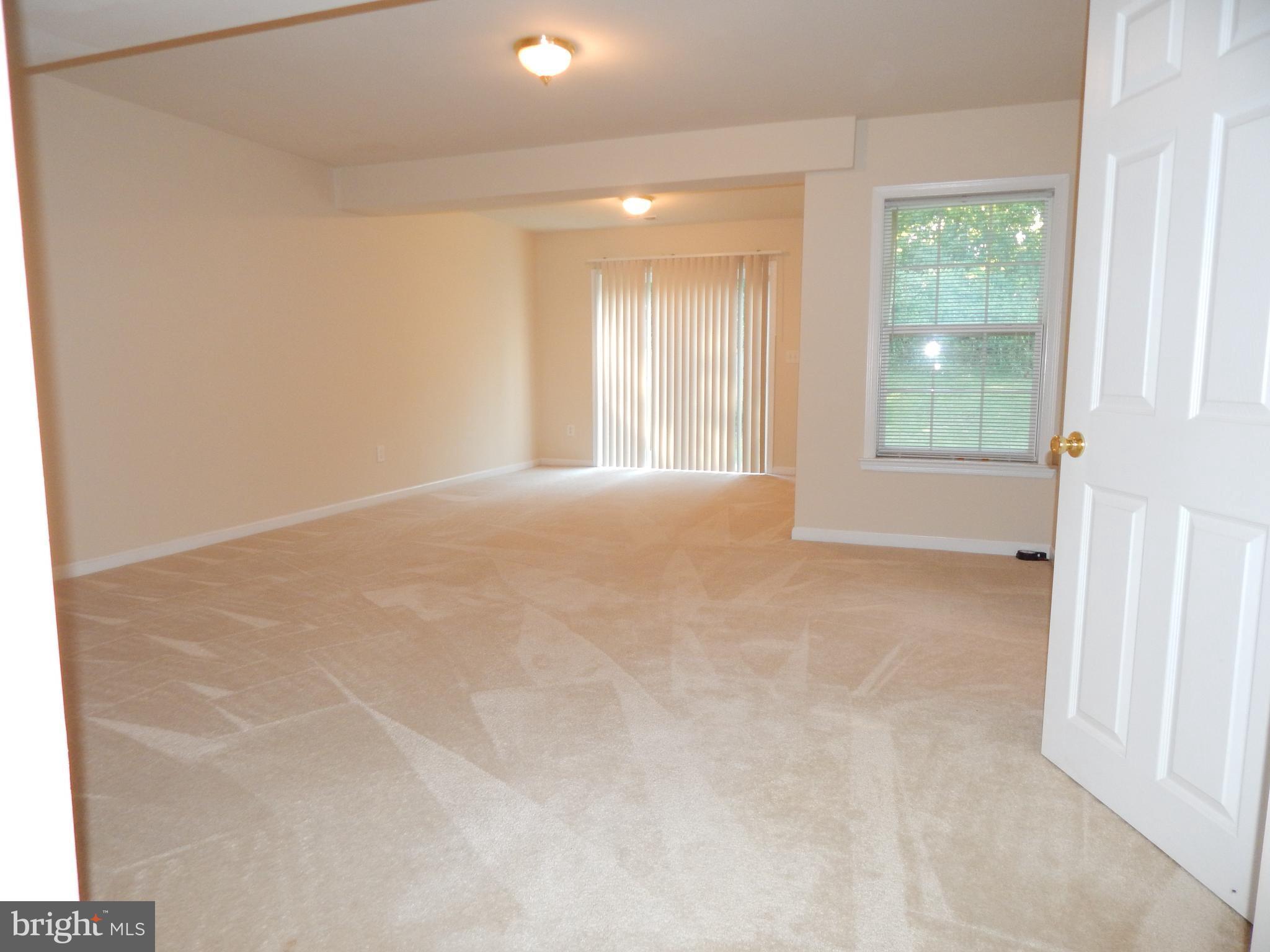 124 Raphael Court Martinsburg, WV 25403 - Photo 6 of 30 a view of an empty room with a window
