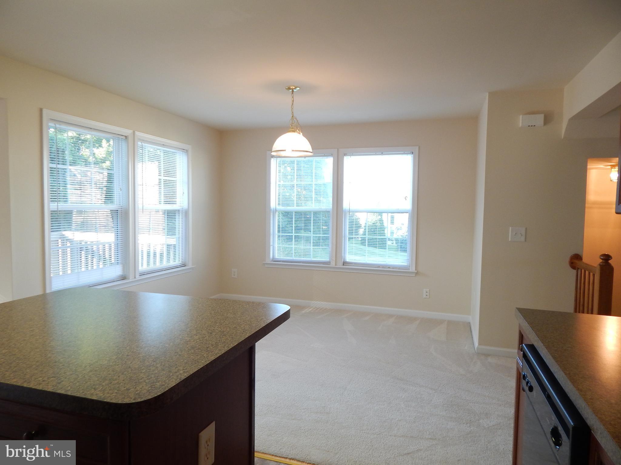 124 Raphael Court Martinsburg, WV 25403 - Photo 7 of 30 a view of kitchen and hall with a window