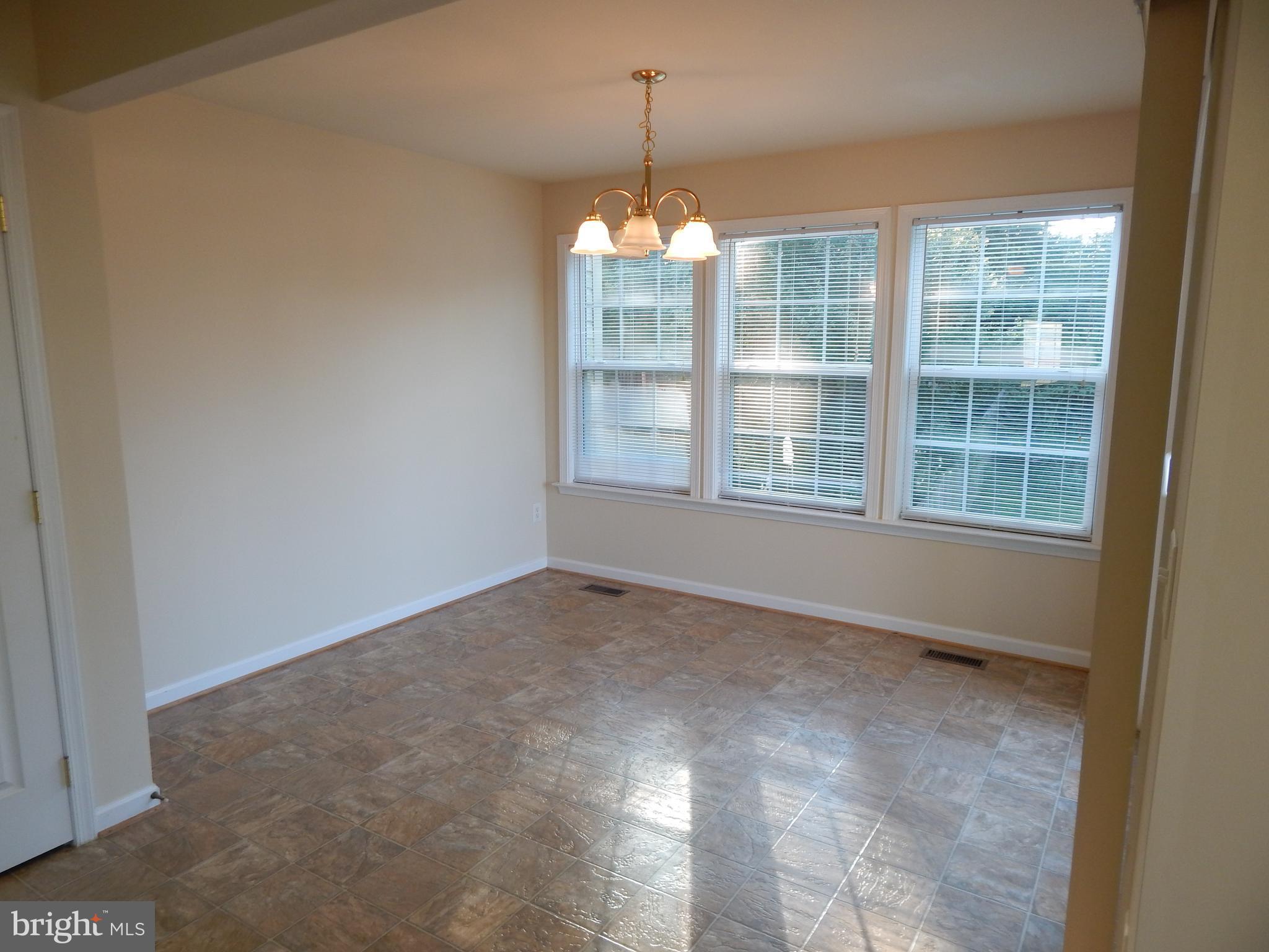 124 Raphael Court Martinsburg, WV 25403 - Photo 10 of 30 a view of an empty room with a window