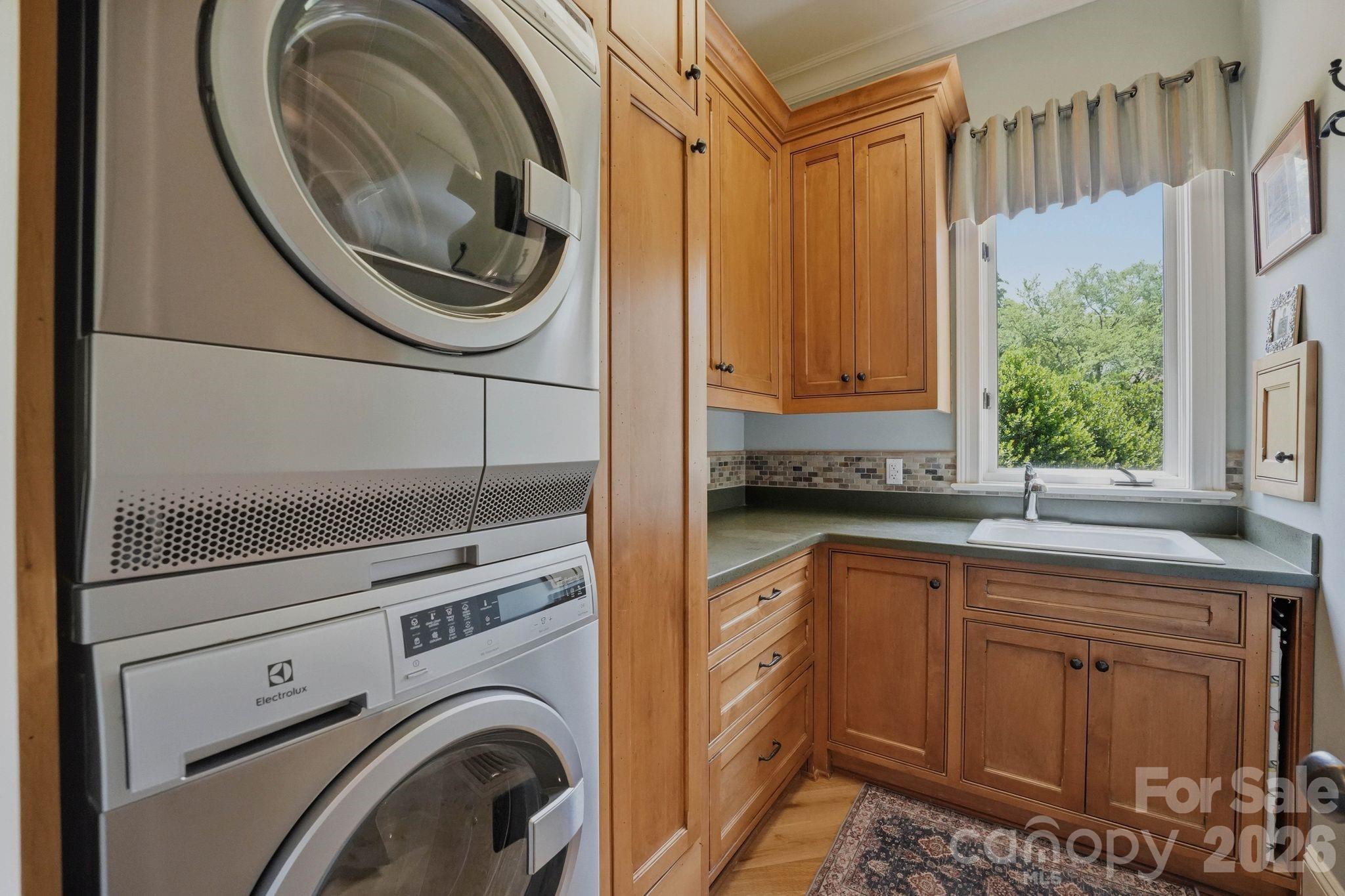 7416 Lee Rea Road Charlotte, NC 28226 - Photo 33 of 48 a view of a washer and dryer