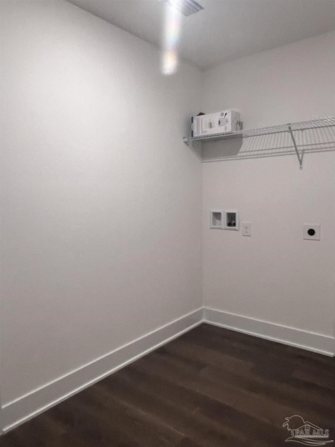 5232 Muscadine Way Milton, FL 32570 - Photo 20 of 23 a view of a room with wooden floor