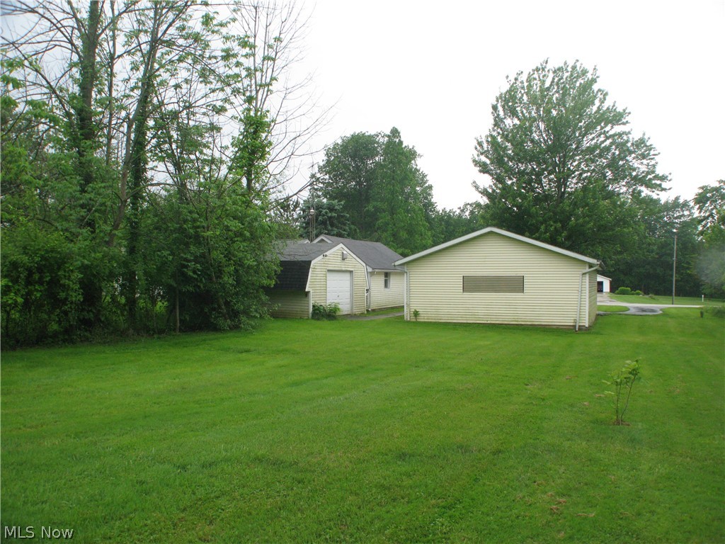 2390 Sexton Road Geneva, OH 44041 - Photo 12 of 17 rear view of detached garage and storage building