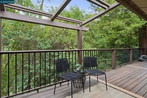 a view of a two chairs in the deck