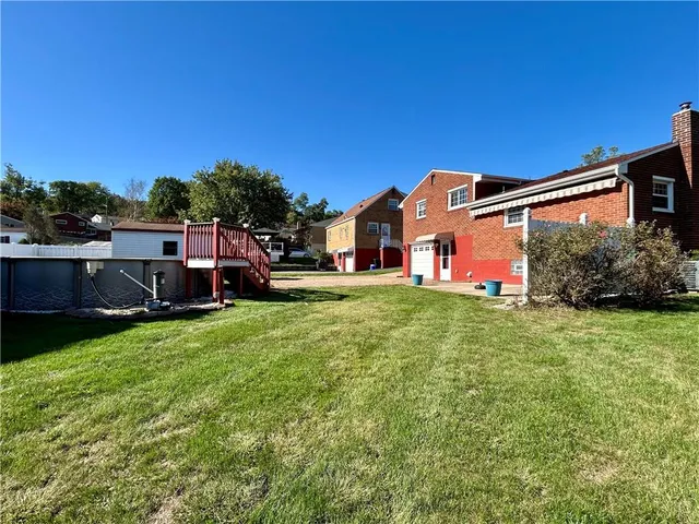 a front view of house with outdoor space and seating area