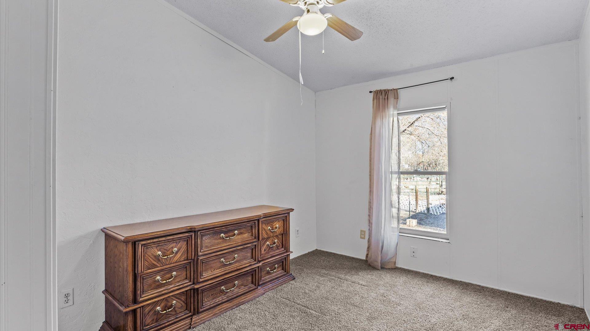 777 1550th Road Delta, CO 81416 - Photo 20 of 32 a view of an empty room with a window