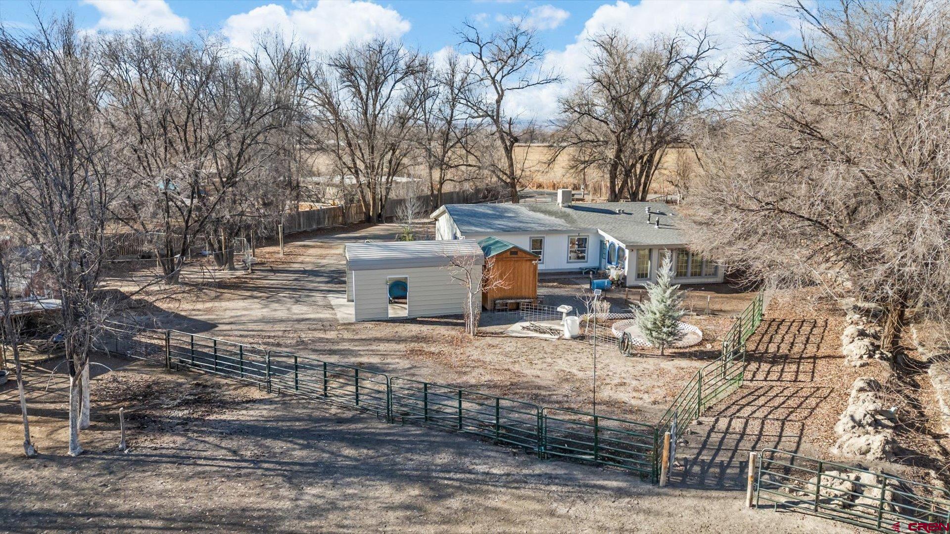 777 1550th Road Delta, CO 81416 - Photo 30 of 32 a view of a house with a yard