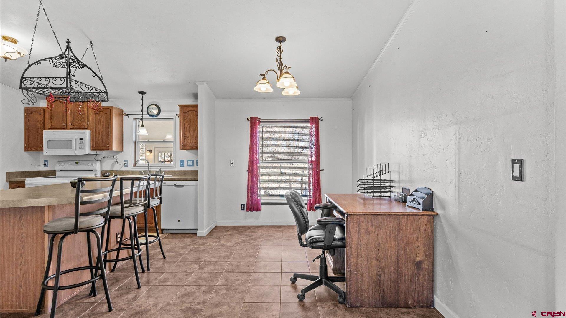 777 1550th Road Delta, CO 81416 - Photo 10 of 32 a view of a dining room with furniture window and outside view