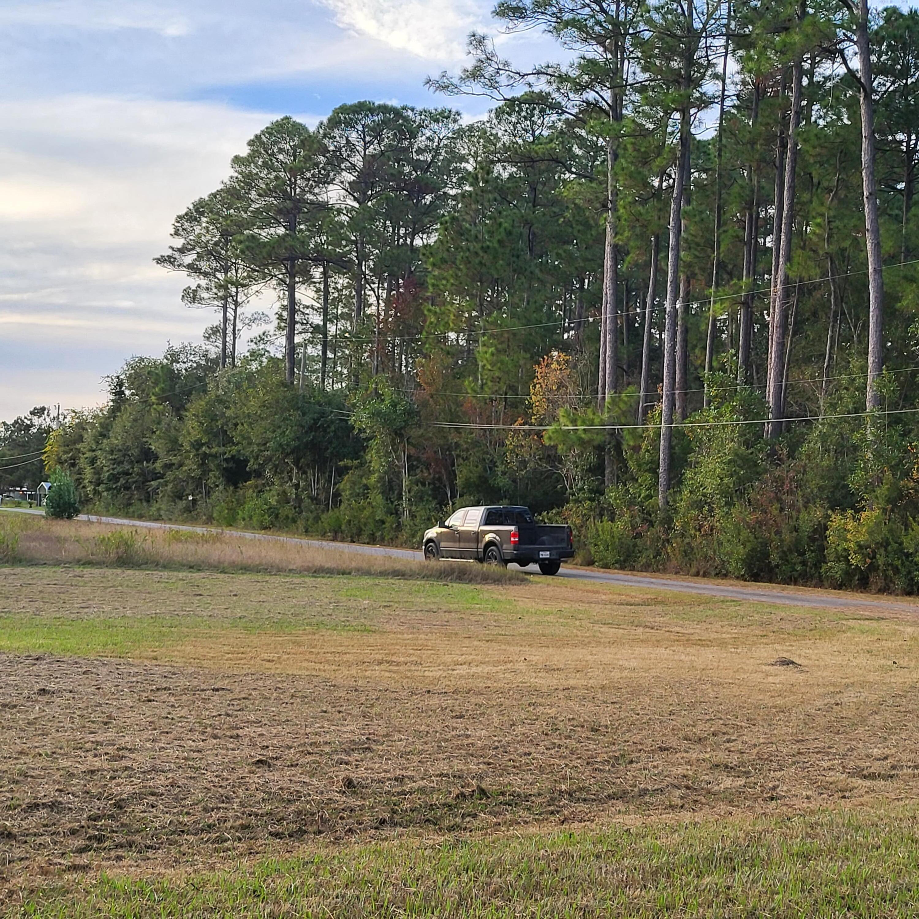 Tbd Owensville Road Milton, FL 32583 - Photo 2 of 4 a view of a lake with a car parked in the ocean