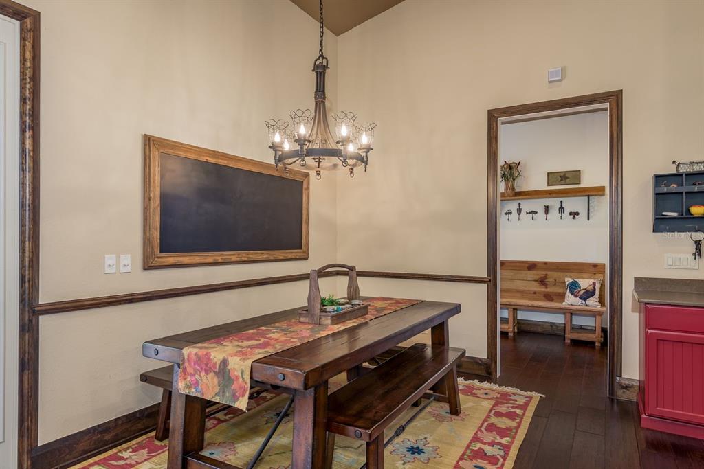 19018 Blake Road Odessa, FL 33556 - Photo 17 of 40 a living room with furniture and a flat screen tv