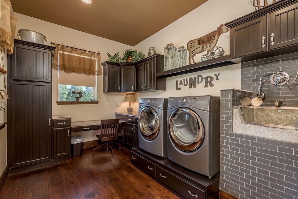19018 Blake Road Odessa, FL 33556 - Photo 19 of 40 a utility room with dryer and washer
