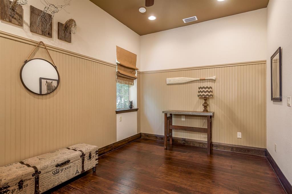 19018 Blake Road Odessa, FL 33556 - Photo 24 of 40 a view of room with window and wooden floor