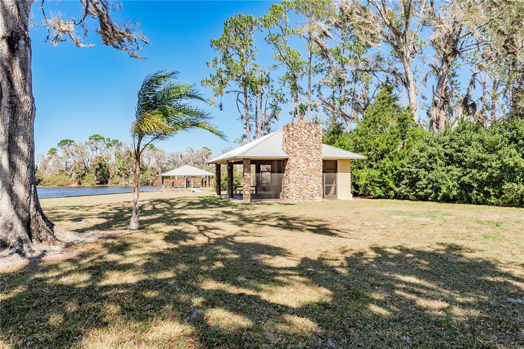 19018 Blake Road Odessa, FL 33556 - Photo 27 of 40 a view of a house with a snow in the yard