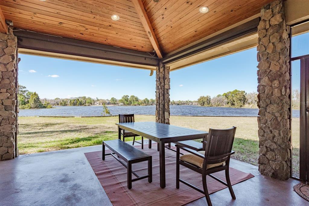 19018 Blake Road Odessa, FL 33556 - Photo 29 of 40 a view of swimming pool with an outdoor seating