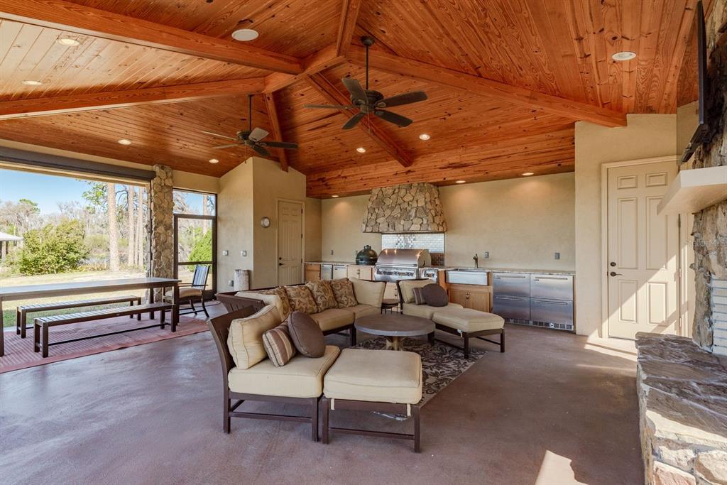 19018 Blake Road Odessa, FL 33556 - Photo 31 of 40 a living room with furniture and a large window