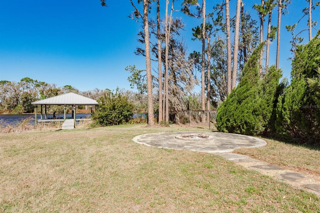 19018 Blake Road Odessa, FL 33556 - Photo 32 of 40 a view of a house with basketball court