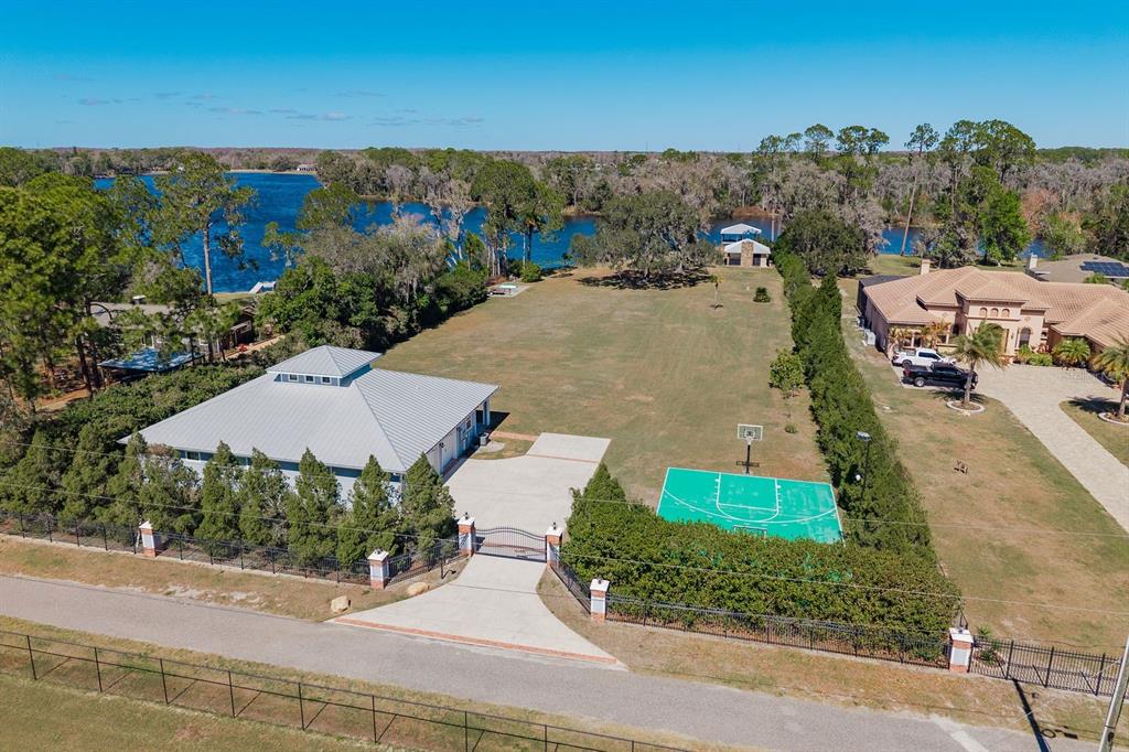 19018 Blake Road Odessa, FL 33556 - Photo 37 of 40 an aerial view of residential houses with outdoor space