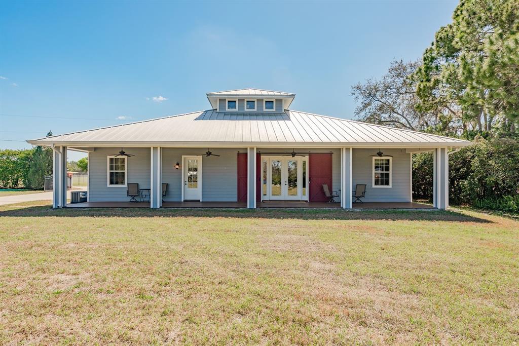19018 Blake Road Odessa, FL 33556 - Photo 5 of 40 front view of a house with a yard