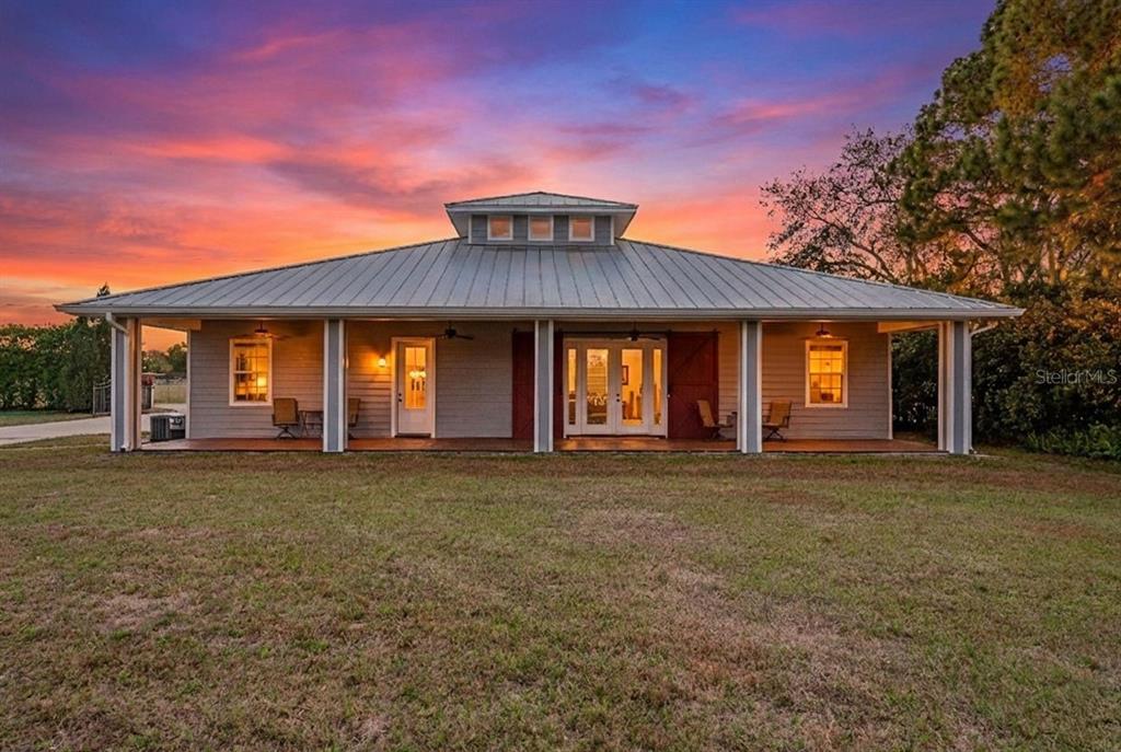 19018 Blake Road Odessa, FL 33556 - Photo 6 of 40 front view of a house with a trees