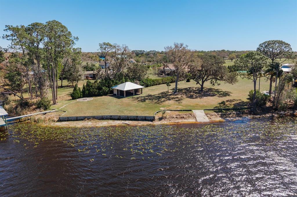 19018 Blake Road Odessa, FL 33556 - Photo 8 of 40 a view of a yard with a house