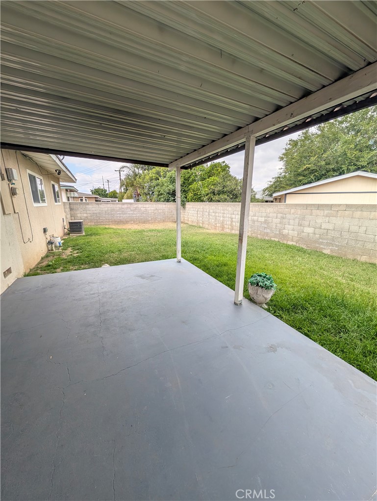 8641 Garfield Street Riverside, CA 92504 - Photo 15 of 19 a view of a house with backyard and porch
