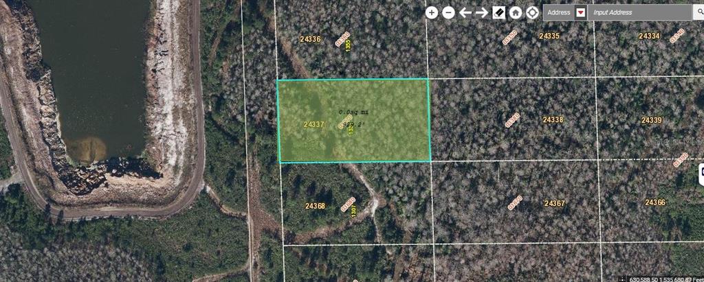 a view of a yard and deck