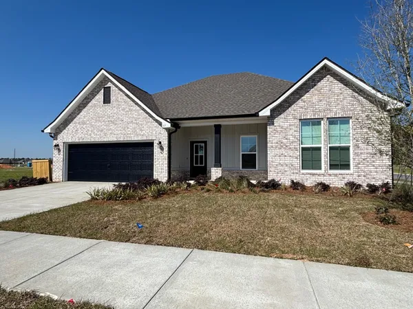 a front view of a house with entertaining space