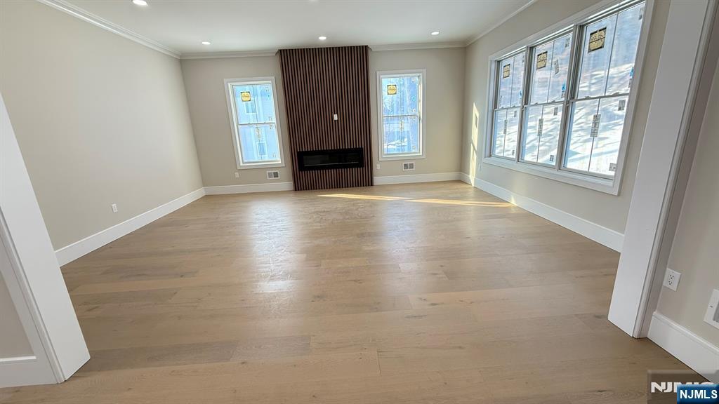 24 Peterson Road Wayne, NJ 07470 - Photo 12 of 31 an empty room with windows and entrance