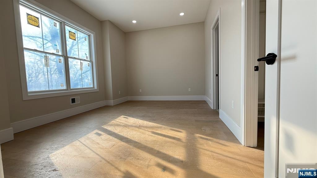 24 Peterson Road Wayne, NJ 07470 - Photo 14 of 31 a view of an empty room with a window
