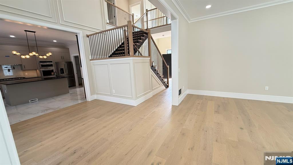 24 Peterson Road Wayne, NJ 07470 - Photo 17 of 31 a view of a storage & utility room with wooden floor