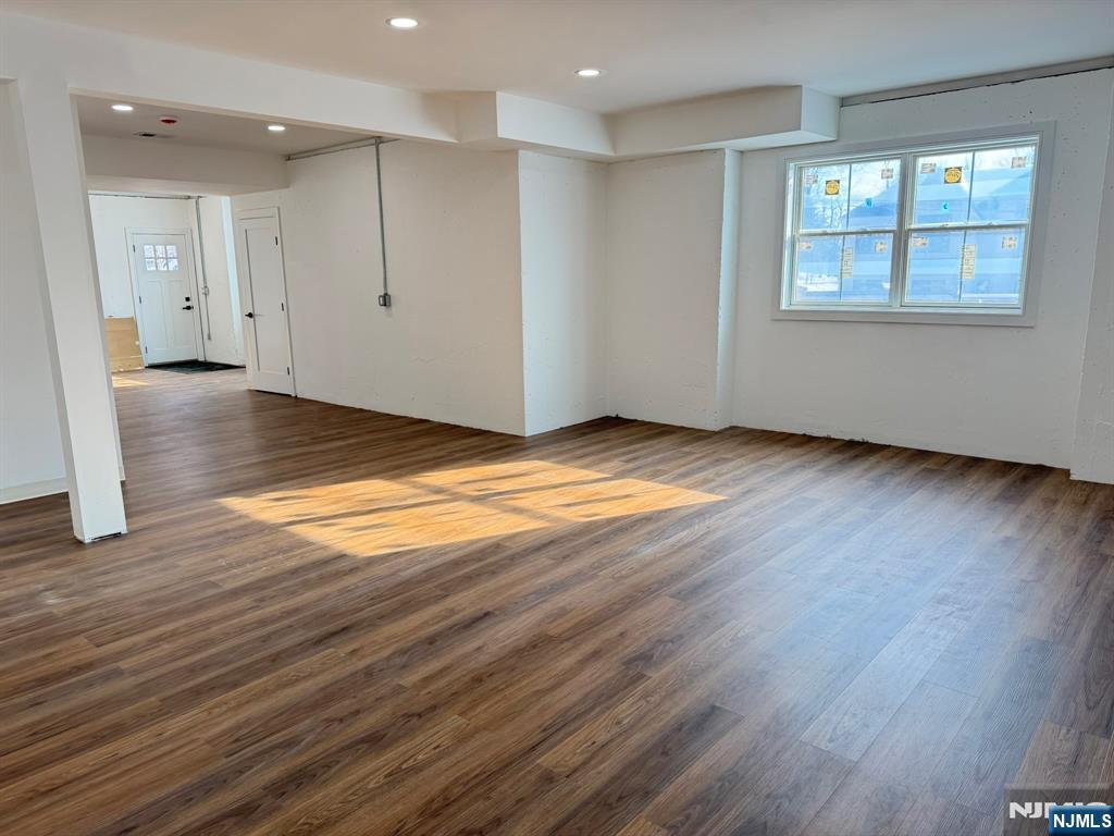24 Peterson Road Wayne, NJ 07470 - Photo 30 of 31 a view of an empty room with wooden floor and a window