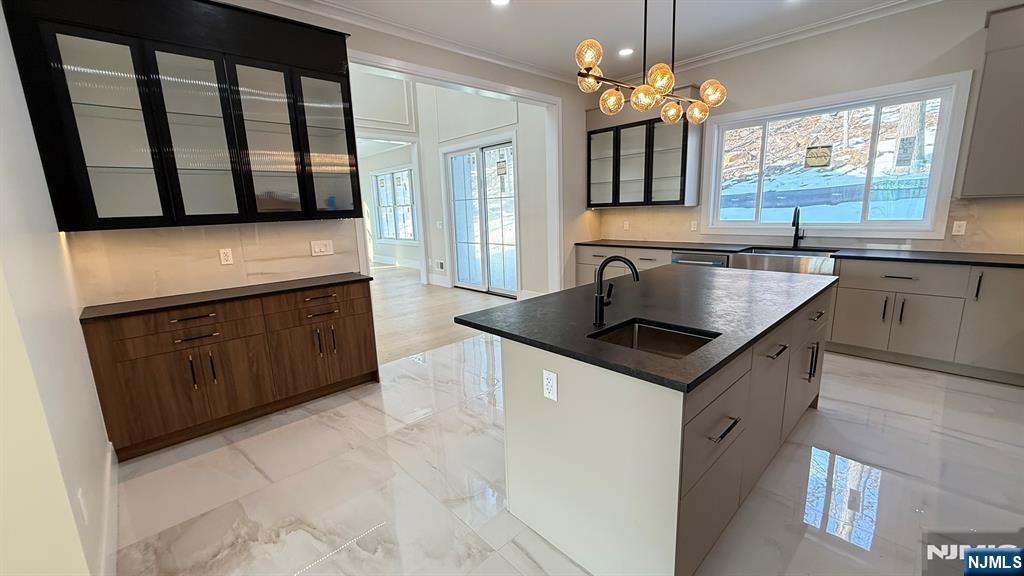 24 Peterson Road Wayne, NJ 07470 - Photo 10 of 31 a kitchen with stainless steel appliances granite countertop a sink and a stove