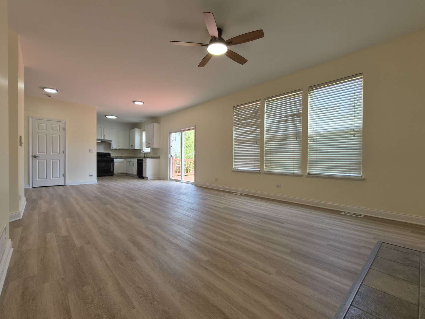2355 Shiloh Drive Aurora, IL 60503 - Photo 13 of 40 a view of empty room with wooden floor and fan