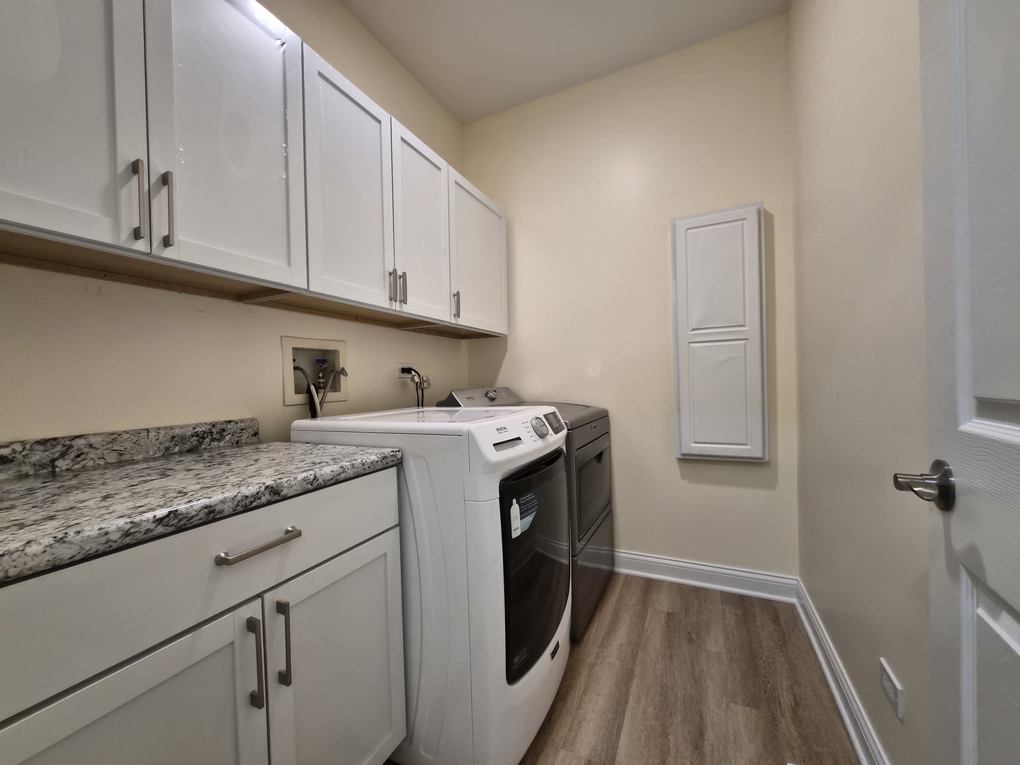 2355 Shiloh Drive Aurora, IL 60503 - Photo 18 of 40 a utility room with cabinets washer and dryer