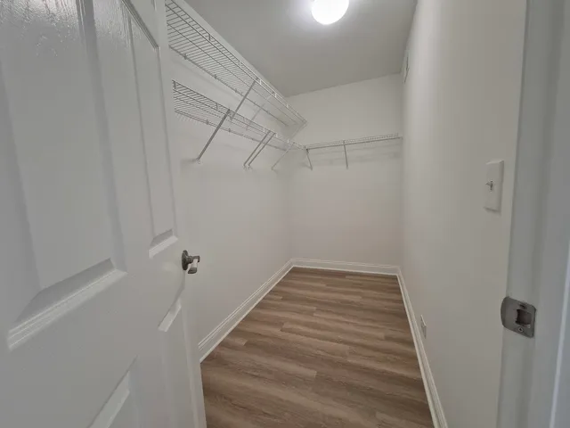 a view of a room with racks on the wall