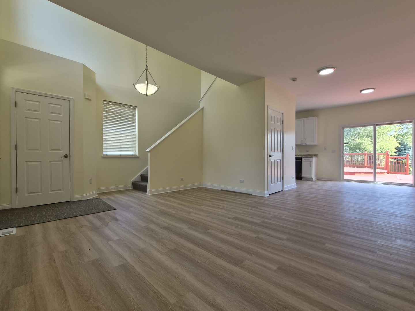 2355 Shiloh Drive Aurora, IL 60503 - Photo 7 of 40 a view of empty room with wooden floor and fan