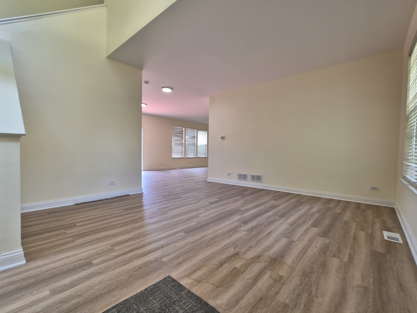 2355 Shiloh Drive Aurora, IL 60503 - Photo 8 of 40 a view of an empty room and wooden floor