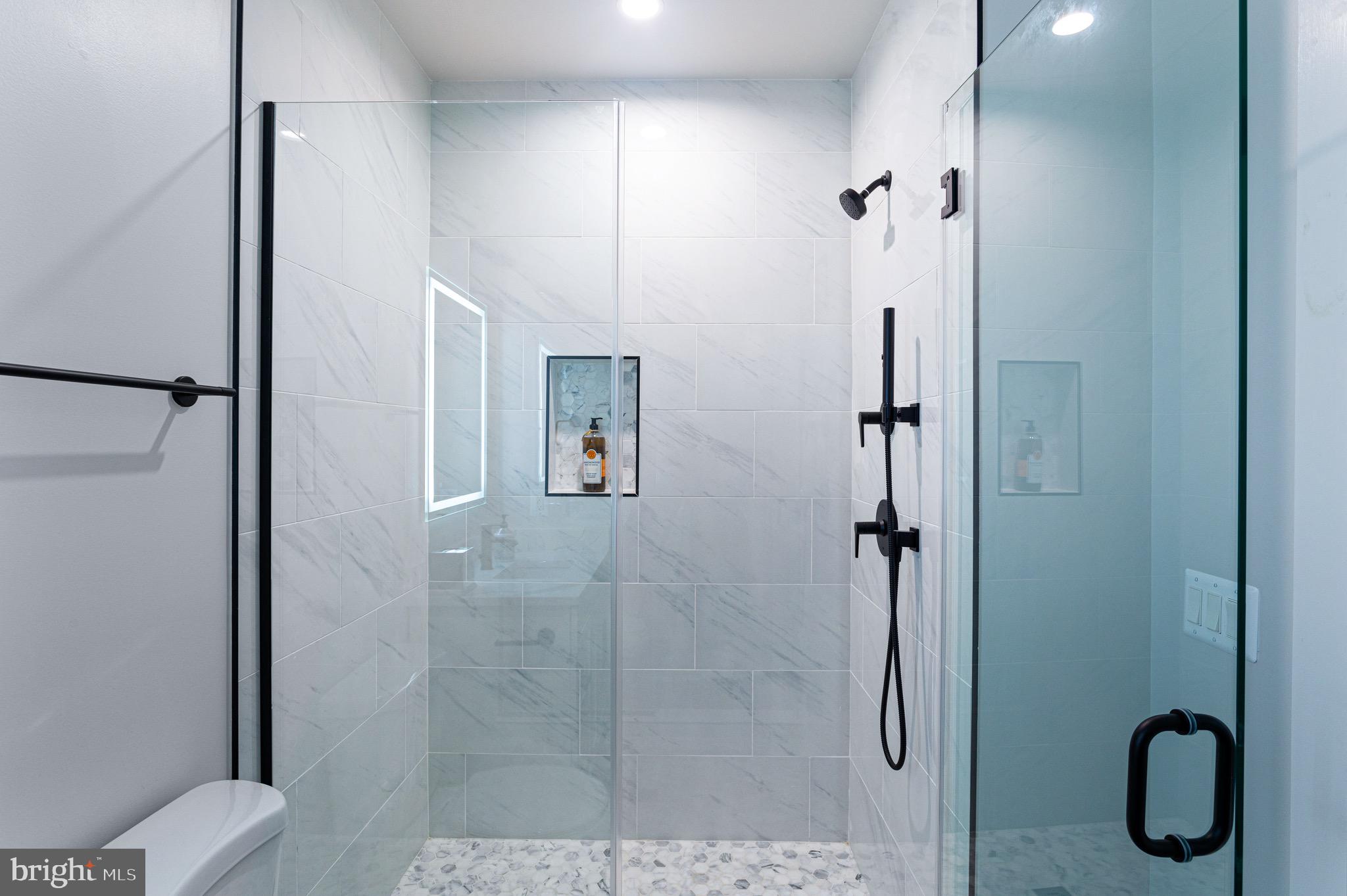 1910 Benning Road Northeast, Unit 2 Washington, DC 20002 - Photo 27 of 30 Glass Enclosed Shower