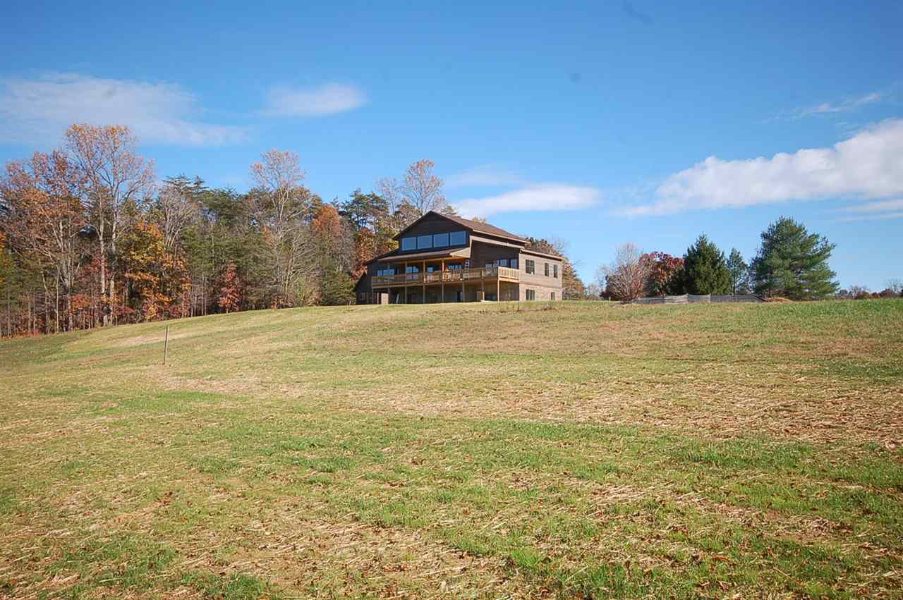 2505 Dunnes Shop Road Ruckersville, VA 22968 - Photo 11 of 29 a view of a large body of water with a building in the background