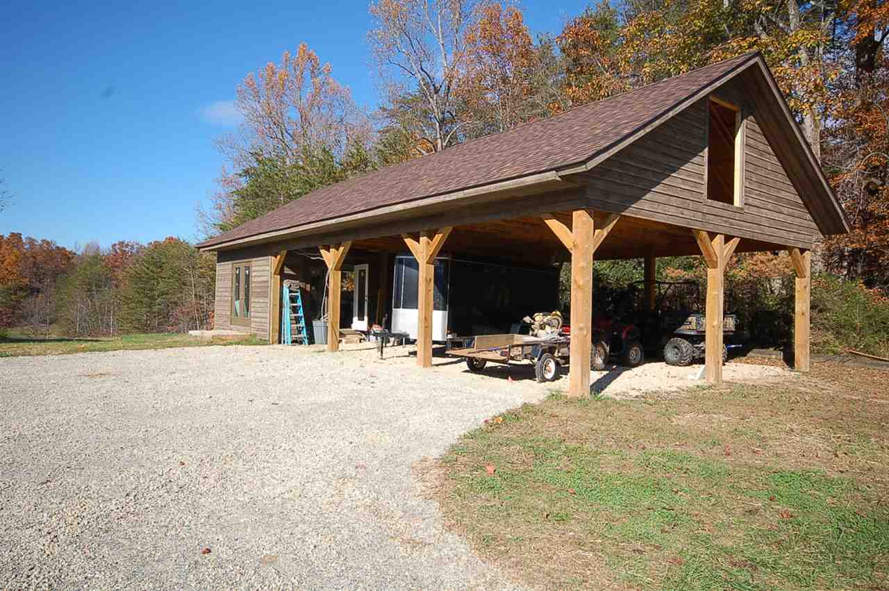 2505 Dunnes Shop Road Ruckersville, VA 22968 - Photo 14 of 29 a view of a house with backyard porch and sitting area