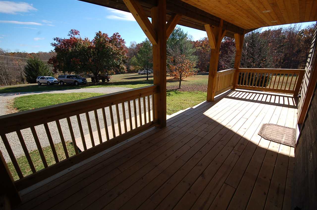 2505 Dunnes Shop Road Ruckersville, VA 22968 - Photo 17 of 29 a view of balcony with wooden floor and outdoor space