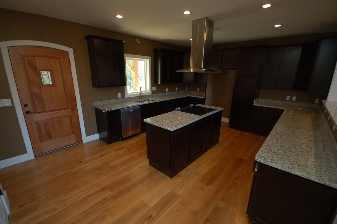 2505 Dunnes Shop Road Ruckersville, VA 22968 - Photo 4 of 29 a kitchen with granite countertop stainless steel appliances and wooden cabinets
