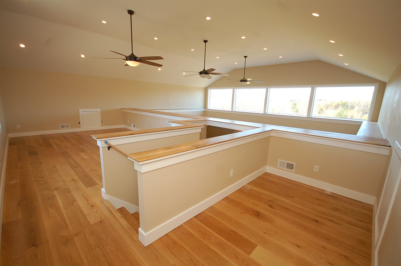 2505 Dunnes Shop Road Ruckersville, VA 22968 - Photo 5 of 29 a view of a kitchen with a sink and wooden floor