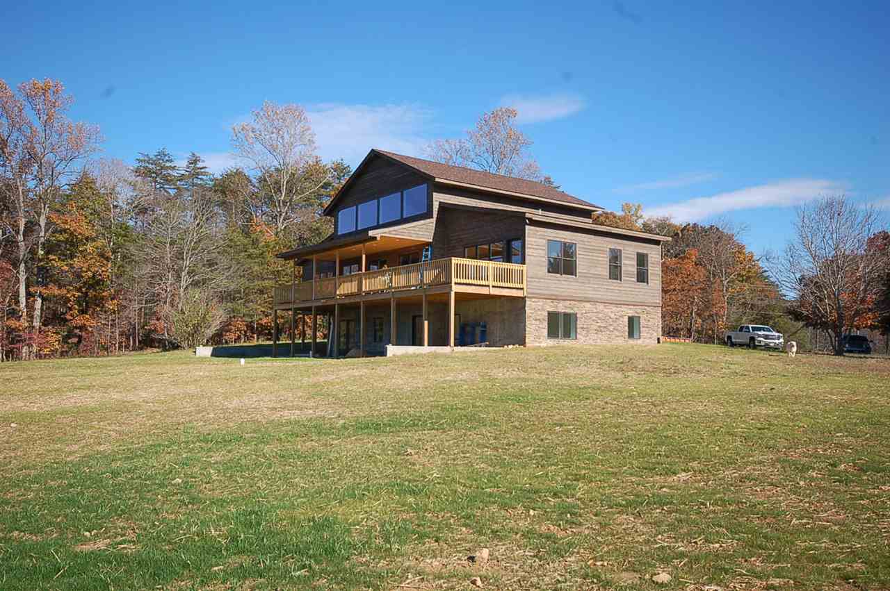 2505 Dunnes Shop Road Ruckersville, VA 22968 - Photo 9 of 29 a front view of a house with a yard