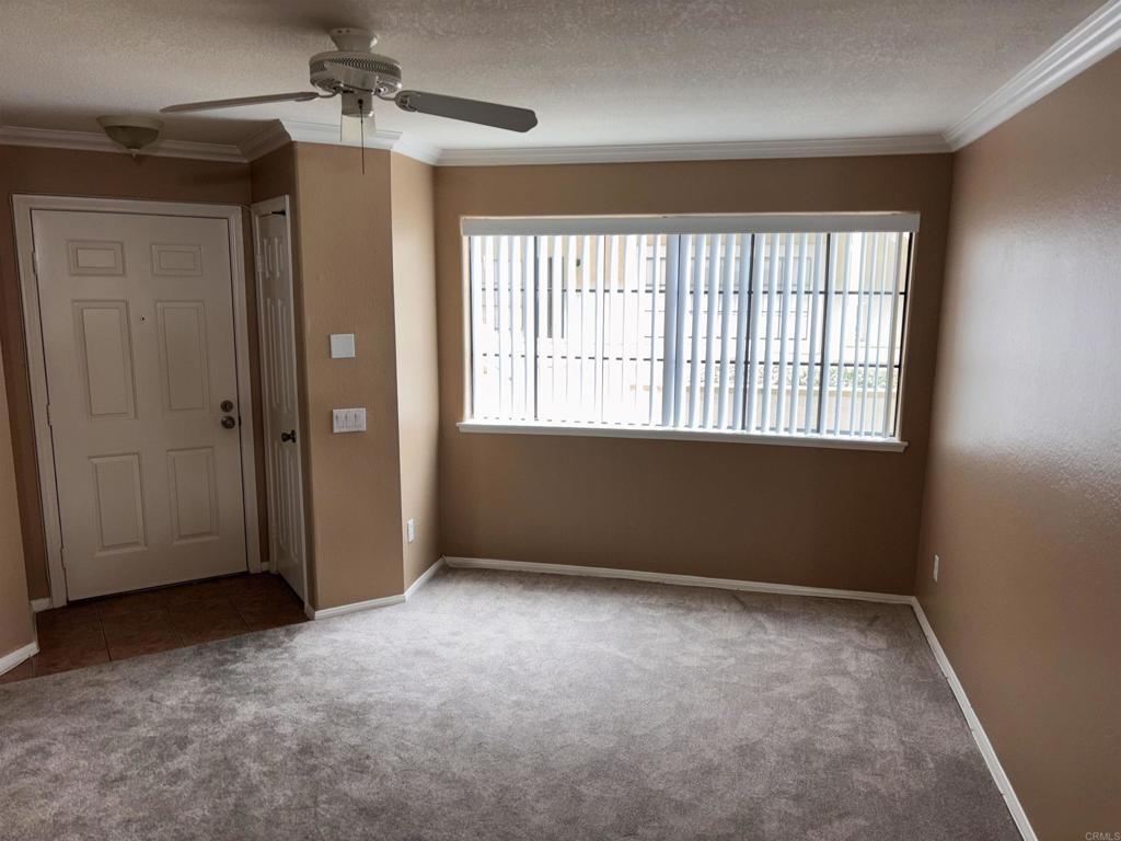 3545 Paseo De Francisco, Unit 225 Oceanside, CA 92056 - Photo 11 of 34 a view of an empty room with a window