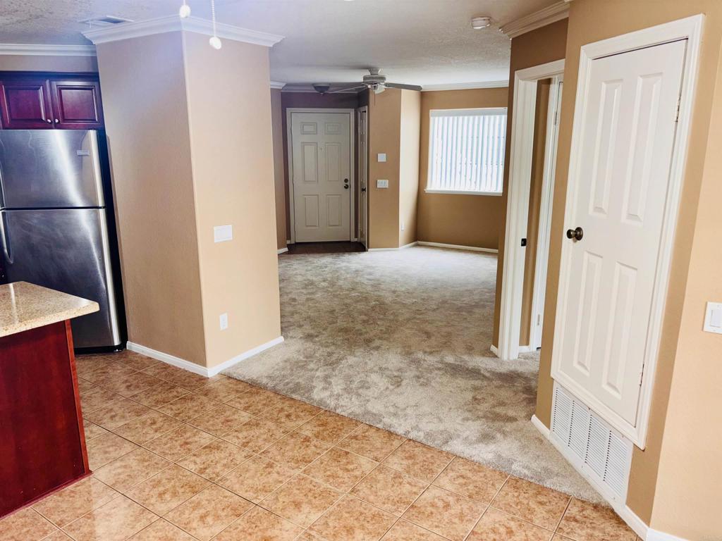 3545 Paseo De Francisco, Unit 225 Oceanside, CA 92056 - Photo 13 of 34 a view of livingroom with furniture and wooden floor