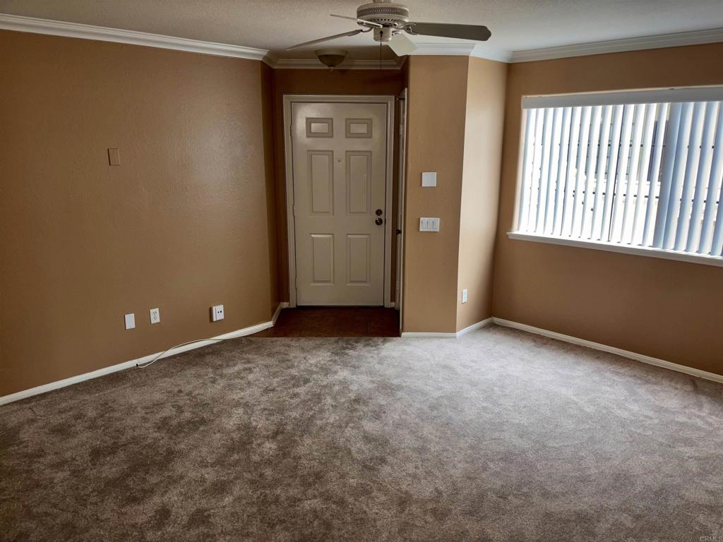 3545 Paseo De Francisco, Unit 225 Oceanside, CA 92056 - Photo 14 of 34 a view of an empty room with a window
